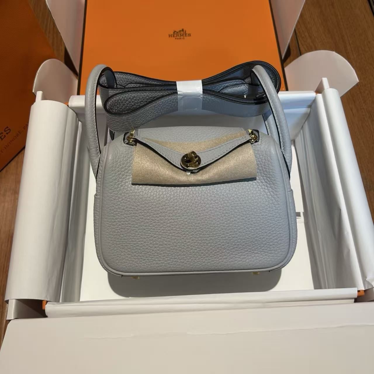Hermès mini Lindy style lychee small bag smog blue light luxury messenger handbag